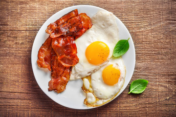Traditional american breakfast with bacon and eggs