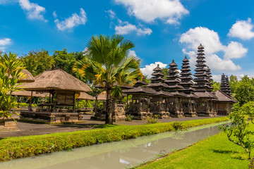 A view along the side of the main sanctum of Meru towers and pavilions in the temple of Pura Taman Ayun in the Mengwi district, Bali, Asia