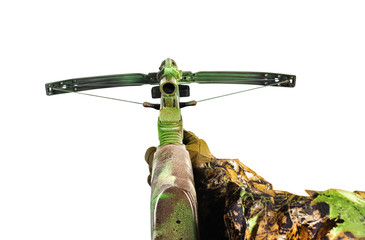 First person view hunter hand in camouflaged suit with crossbow.
