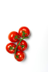 red tomatoes on a white background