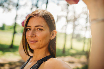 Young Caucasian woman working out with a dumbbells