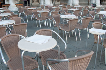 Empty tables in Piazza San Marco in Venice.
