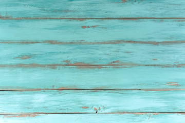 Wood rustic light blue or green background. Old wooden table, top view. Vintage natural texture, grunge weathered surface, copy space for your text.
