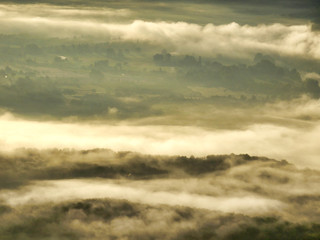 Obraz premium Early morning mist as viewed from a hot air balloon at sunrise