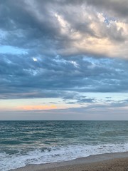 Naklejka na ściany i meble sunset with beautiful blue sky on the beach