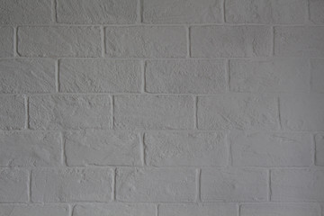 White-gray brick wall. Background