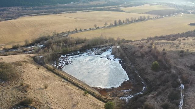 Aerial view of gudron tar toxic waste pits during winter season