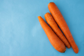 Vegetables, carrots on a blue background