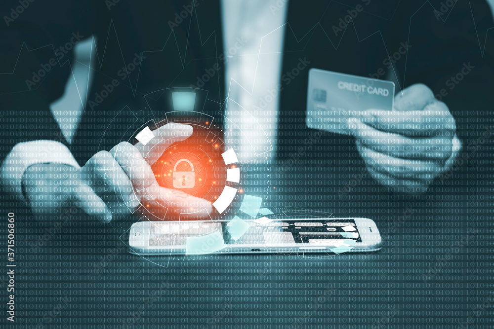 Poster businessman hacker is using a hand typing keyboard and uses a modern credit card by laptop screen ha