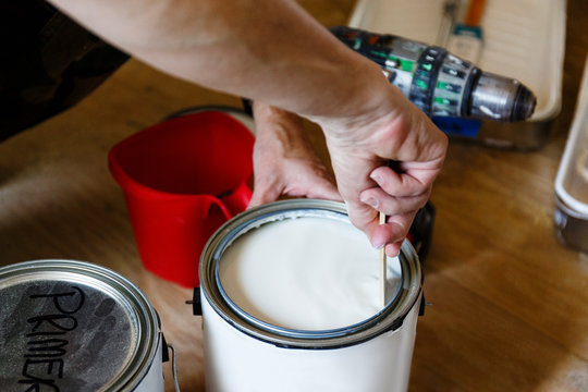 Hand Of Native American Woman Stirring Paint