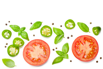 fresh tomato slices with green pepper and basil leaves isolated on white background. top view
