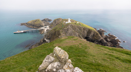 Views of the southern end of Lundy Island with a misty sky, The Bristol Channel, Devon, UK
