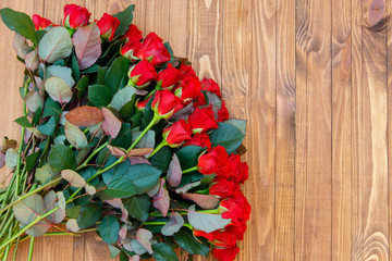 red flowers on wooden background
