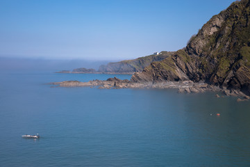 Views of Ilfracombe Harbour looking towards Beacon Point, Devon, UK
