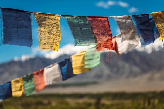 Colorful prayer flags hanging outdoors