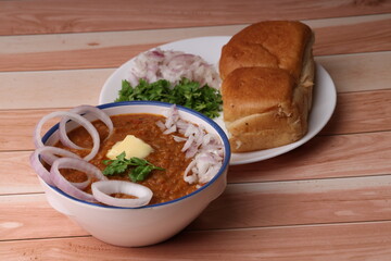 Pav Bhaji Indian spicy fast food with bread, onion and butter, Indian food, Mumbai food