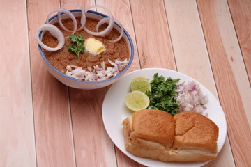 Pav Bhaji Indian spicy fast food with bread, onion and butter, Indian food, Mumbai food
