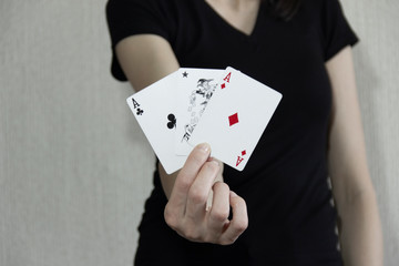 a woman who shows winning cards