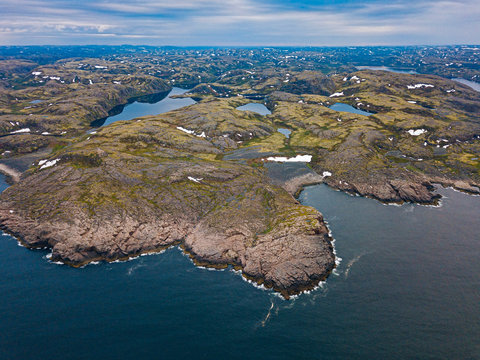 Russia, Murmansk Oblast, Teriberka, Aerial view of rocky coastline of Barents Sea