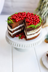 christmas cake chocolate with white butter cream fruit pudding red berries currant serving size New Year's natural product portion top view place for text copy space