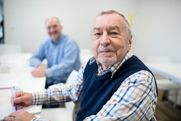Senior man attending seniors education course