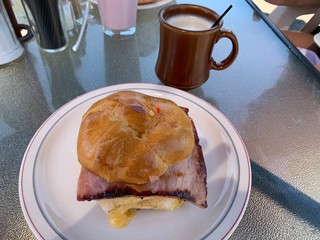breakfast sandwich and coffee