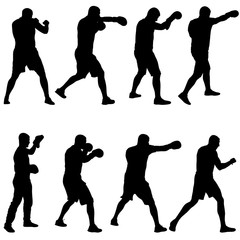 Black set silhouette of an athlete boxer on a white background