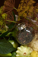 Jar with peppercorns Close-up on wooden background