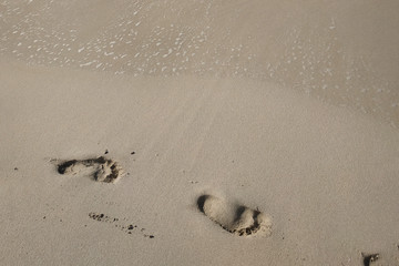 footprints on the beach