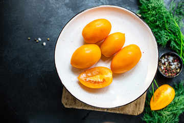 tomato yellow salad vegetables slices natural product ingredient serving portion size organic healthy eating top view place for text copy space 