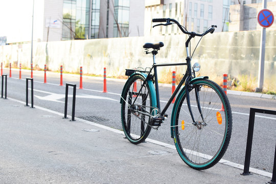 Green city bike on street, pedal, bicycle