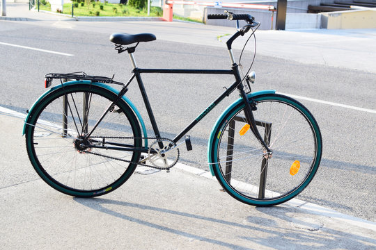 Green city bike on street, pedal, bicycle