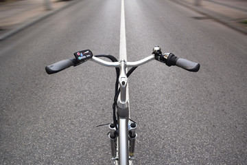Fototapeta na wymiar electric bicycle in motion wheel on the street, e-bike, city bike