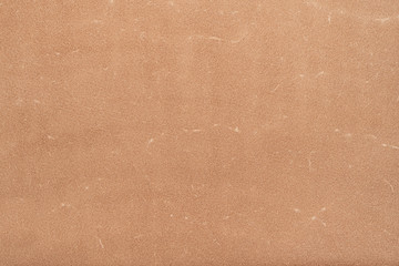 Fototapeta premium Leather. Close up beige color suede texture background 