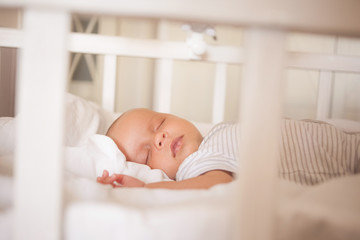 baby sleeps in crib