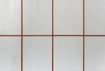 Close-up on a texture of a washi paper used as japanese shōji screen on a kōshi wooden lattice frame.