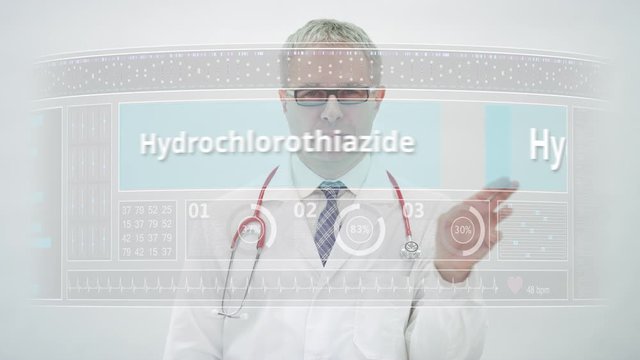 HYDROCODONE generic drug name scrolled by a doctor on a modern screen