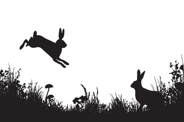 Hares in the meadow silhouettes. Wall art black and white © Julia