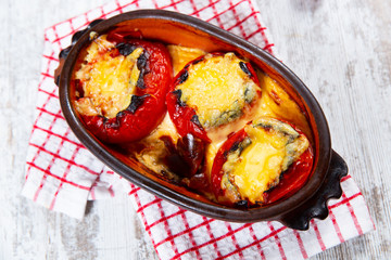 Stuffed tomatoes. Tomatoes baked with cheese and meat