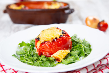Stuffed tomatoes. Tomatoes baked with cheese and meat