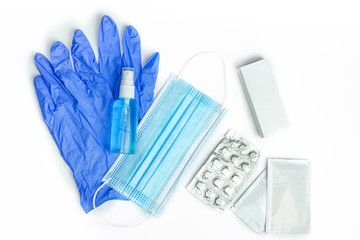 mask gloves and antiseptic lie on a white background