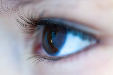 close up of male boy eye
