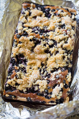 Yeast blueberry cake with crumble and sugar 