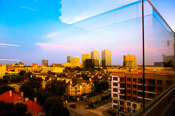reflection of sunset over city