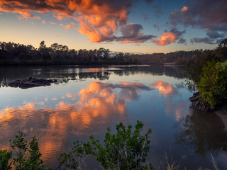 Beautiful Riverside Sunrise with Reflections