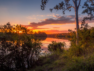 Beautiful Riverside Sunset with Reflections