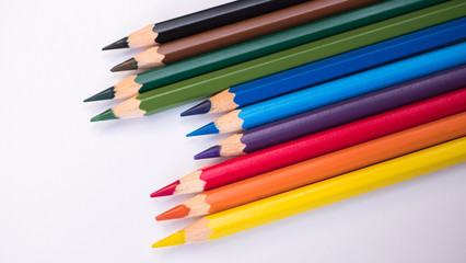 colored pencils are on the table