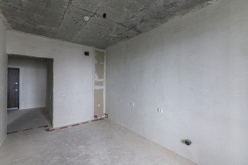 Russia, Moscow- February 10, 2020: interior room apartment rough repair for self-finishing. interior decoration, bare walls of the premises, stage of construction