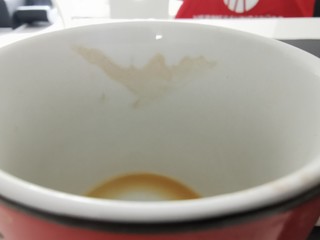 Empty cup of coffee, leere Kaffetasse mit Vogelabdruck