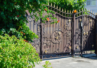 beautiful design of the fence, fencing of the territory. gate in a private house